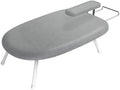 Cette table de repassage dispose d'une partie textile en coton et d'une structure pliante